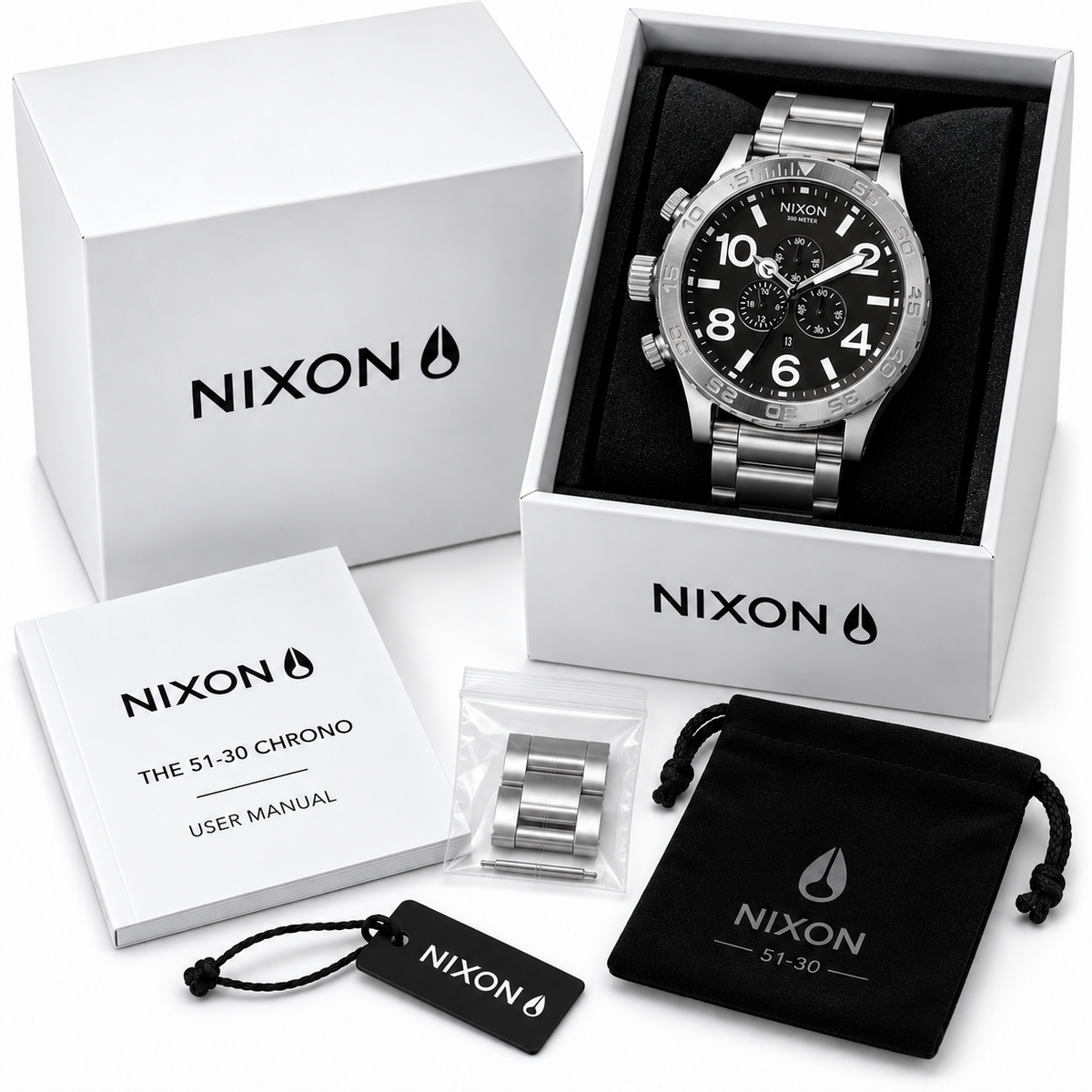 Nixon 51-30 Chrono A083-000 in open Nixon presentation box with user manual, spare links, tag and pouch